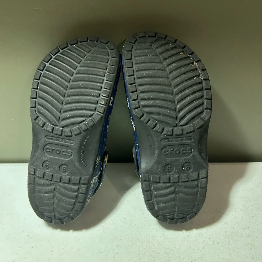 CROCS Navy Blue Printed Slip-On Clogs with Yellow Accents